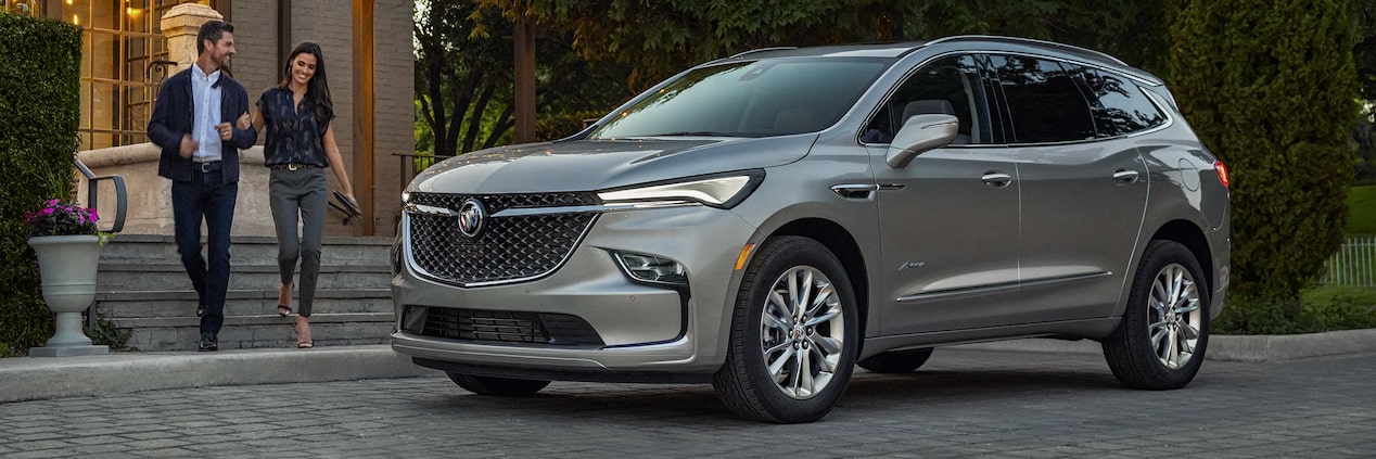 2024 Buick Enclave Avenir parked on the side of a road.