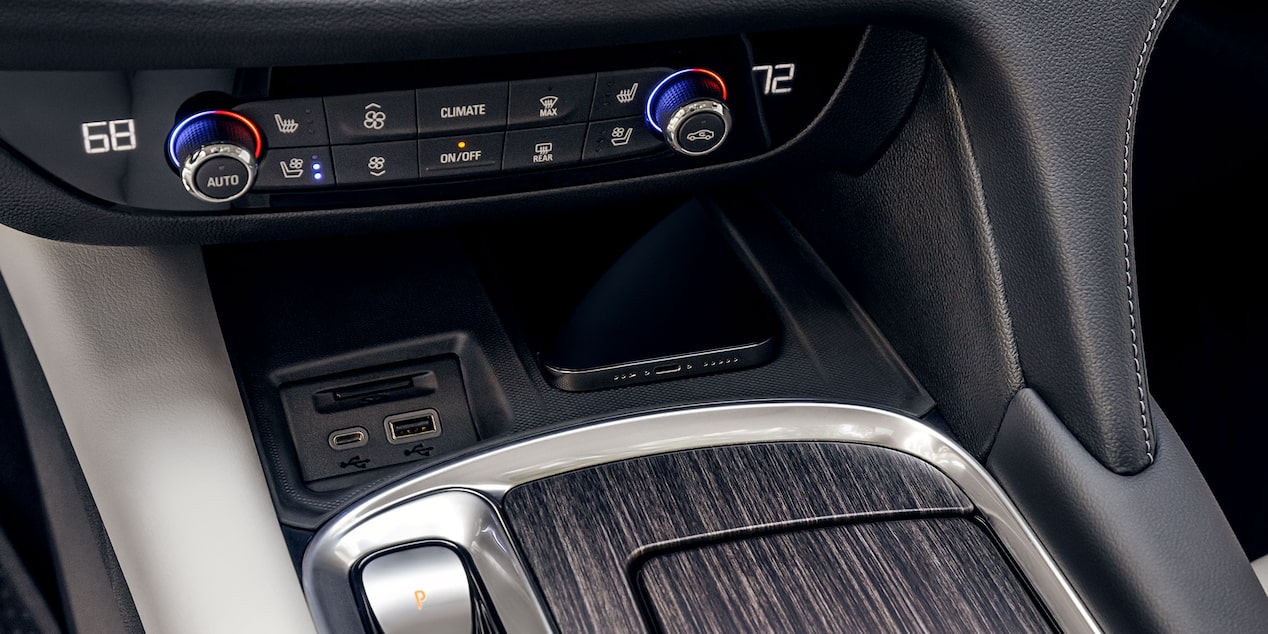 2024 Buick Enclave Sport Touring temperature controls and charging ports.