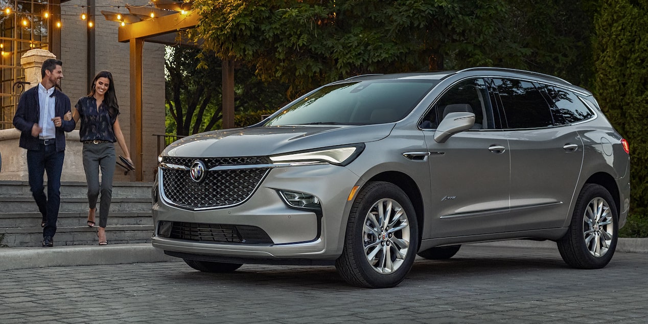 2024 Buick Enclave Avenir parked on the side of a road.