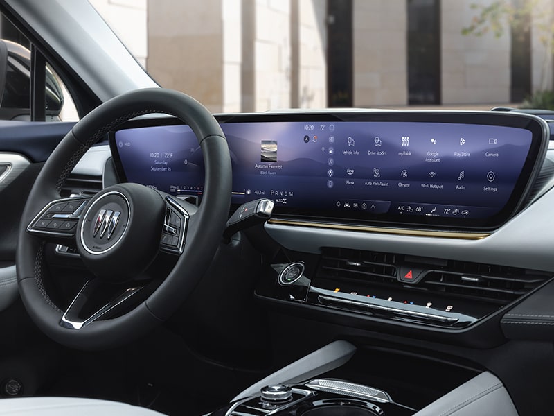 Wide Interior View of the front interiors in a 2025 Buick Envision Avenir Compact Luxury SUV.