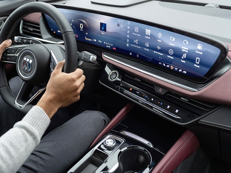 Wide Interior View of the Steering Wheel and Digital Dashboard in a 2025 Buick Envision Avenir Compact Luxury SUV.