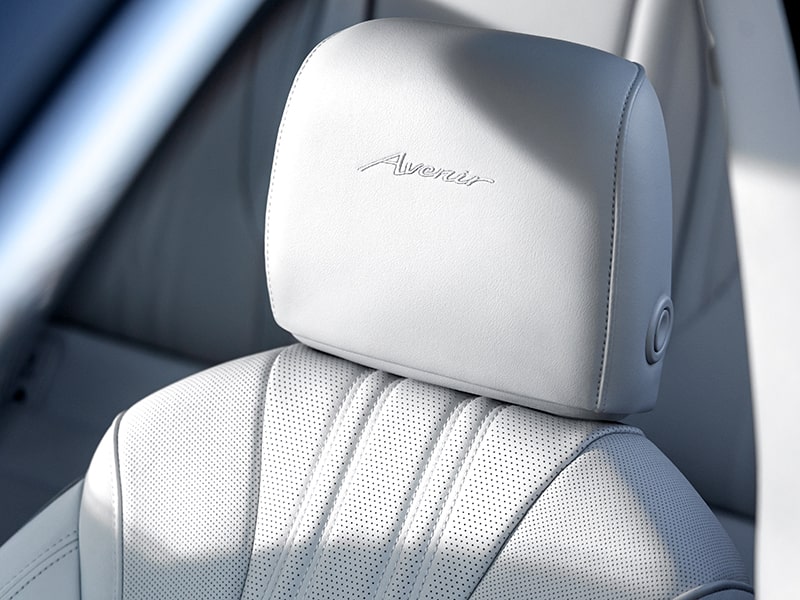 Close-up view of the "Avenir" Stitching on the Seat Headrest in a 2025 Buick Envision Avenir Luxury Compact SUV.